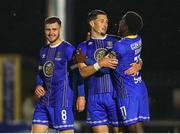 4 August 2023; Ronan Coughlan of Waterford, centre, celebrates after scoring his side's third goal with teammates Barry Baggley, left, and Serge Atakayi during the SSE Airtricity Men's First Division match between Waterford and Kerry at RSC in Waterford. Photo by Michael P Ryan/Sportsfile