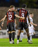 4 August 2023; Bohemians players Danny Grant, left, and Jonathan Afolabi after their side's victory in the SSE Airtricity Men's Premier Division match between Bohemians and Drogheda United at Dalymount Park in Dublin. Photo by Seb Daly/Sportsfile