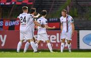 4 August 2023; Jamie Egan of Drogheda United, right, celebrates with teammates after scoring their side's second goal during the SSE Airtricity Men's Premier Division match between Bohemians and Drogheda United at Dalymount Park in Dublin. Photo by Seb Daly/Sportsfile