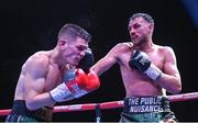 4 August 2023; Sean McComb, right, and Alejandro Moya during their WBO European Super-Lightweight title bout during the Féile Fight Night at Falls Park in Belfast. Photo by Ramsey Cardy/Sportsfile