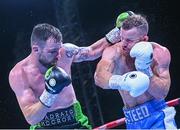 4 August 2023; Padraig McCrory, left, and Steed Woodall, right, during their super-middleweight bout during the Féile Fight Night at Falls Park in Belfast. Photo by Ramsey Cardy/Sportsfile