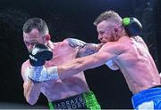 4 August 2023; Padraig McCrory, left, and Steed Woodall during their super-middleweight bout during the Féile Fight Night at Falls Park in Belfast. Photo by Ramsey Cardy/Sportsfile