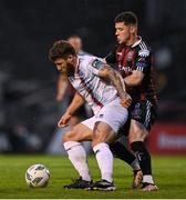 4 August 2023; Gary Deegan of Drogheda United in action against Ali Coote of Bohemians during the SSE Airtricity Men's Premier Division match between Bohemians and Drogheda United at Dalymount Park in Dublin. Photo by Seb Daly/Sportsfile
