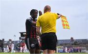 4 August 2023; Jonathan Afolabi of Bohemians remonstrates with assistant referee Emmett Dynan during the SSE Airtricity Men's Premier Division match between Bohemians and Drogheda United at Dalymount Park in Dublin. Photo by Seb Daly/Sportsfile