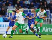 4 August 2023; Barry Baggley of Waterford is tackled by Kerry FC players Ethan Kos, left, and Martin Coughlan during the SSE Airtricity Men's First Division match between Waterford and Kerry at RSC in Waterford. Photo by Michael P Ryan/Sportsfile