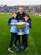 30 July 2023; Dublin manager Dessie Farrell with Luke O’Regan, left, and Oisìn O’Regan, right, and the Sam Maguire Cup after the GAA Football All-Ireland Senior Championship final match between Dublin and Kerry at Croke Park in Dublin. Photo by Ramsey Cardy/Sportsfile