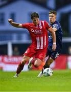 4 August 2023; Nando Pijnaker of Sligo Rovers in action against Tommy Lonergan of St Patrick's Athletic during the SSE Airtricity Men's Premier Division match between Sligo Rovers and St Patrick's Athletic at The Showgrounds in Sligo. Photo by Tyler Miller/Sportsfile