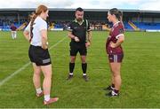 5 August 2023; Referee Seamus Mulvihill performs the coin-toss with team captains Eimear Glancy of Kildare and Aoibhinn Eilian of Galway before the ZuCar All-Ireland Ladies Football U18 A final match between Galway and Kildare at Glennon Brothers Pearse Park in Longford. Photo by Ben McShane/Sportsfile