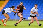 5 August 2023; Aisling Madden of Galway scores her side's first goal despite the tackle of Julie Brannigan of Kildare during the ZuCar All-Ireland Ladies Football U18 A final match between Galway and Kildare at Glennon Brothers Pearse Park in Longford. Photo by Ben McShane/Sportsfile