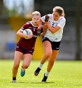 5 August 2023; Katie Slattery of Galway is tackled by Sarah McGovern of Kildare during the ZuCar All-Ireland Ladies Football U18 A final match between Galway and Kildare at Glennon Brothers Pearse Park in Longford. Photo by Ben McShane/Sportsfile