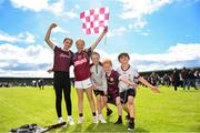 5 August 2023; Galway supporters celebrate after the ZuCar All-Ireland Ladies Football U18 A final match between Galway and Kildare at Glennon Brothers Pearse Park in Longford. Photo by Ben McShane/Sportsfile