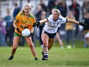 5 August 2023; Eva Gallagher of Donegal in action against Ciara Whelan Barrett of Waterford during the ZuCar All-Ireland Ladies Football U18 C final match between Donegal and Waterford at Kinnegad in Westmeath. Photo by Piaras Ó Mídheach/Sportsfile