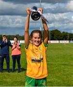 5 August 2023; Donegal captain Niamh Harkin lifts the cup after her side's victory in the ZuCar All-Ireland Ladies Football U18 C final match between Donegal and Waterford at Kinnegad in Westmeath. Photo by Piaras Ó Mídheach/Sportsfile