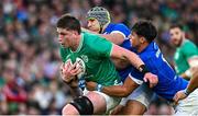 5 August 2023; Joe McCarthy of Ireland is tackled by Juan Ignacio Brex, left, and Tommaso Menoncello of Italy during the Bank of Ireland Nations Series match between Ireland and Italy at the Aviva Stadium in Dublin. Photo by Ramsey Cardy/Sportsfile