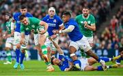 5 August 2023; Jacob Stockdale of Ireland is tackled by Paolo Odogwu of Italy during the Bank of Ireland Nations Series match between Ireland and Italy at the Aviva Stadium in Dublin. Photo by Ramsey Cardy/Sportsfile