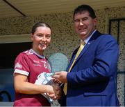 5 August 2023; Aoibhinn Eilian of Galway is presented with the ZuCar Player of the Match by Uachtarán Cumann Peil Gael na mBan, Mícheál Naughton after the ZuCar All-Ireland Ladies Football U18 A final match between Galway and Kildare at Glennon Brothers Pearse Park in Longford. Photo by Sportsfile