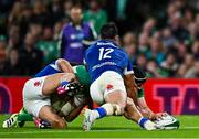 5 August 2023; Caelan Doris of Ireland dives over to score his side's fifth try despite the tackle of Tommaso Menoncello of Italy during the Bank of Ireland Nations Series match between Ireland and Italy at the Aviva Stadium in Dublin. Photo by Harry Murphy/Sportsfile
