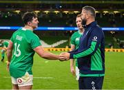 5 August 2023; Ireland head coach Andy Farrell shakes hands with Tom Stewart of Ireland alongside teammate Ciaran Frawley after making their debuts in the Bank of Ireland Nations Series match between Ireland and Italy at the Aviva Stadium in Dublin. Photo by Harry Murphy/Sportsfile