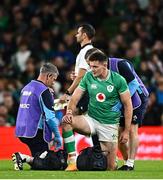 5 August 2023; Jacob Stockdale of Ireland is treated for an injury during the Bank of Ireland Nations Series match between Ireland and Italy at the Aviva Stadium in Dublin. Photo by Ramsey Cardy/Sportsfile