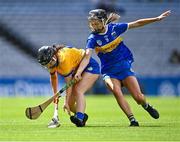6 August 2023; Grace Carmody of Clare in action against Katie Fitzgerald of Tipperary during the Glen Dimplex All-Ireland Camogie Championship Premier Junior Final match between Clare and Tipperary at Croke Park in Dublin. Photo by Piaras Ó Mídheach/Sportsfile