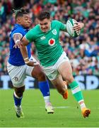 5 August 2023; Jacob Stockdale of Ireland in action against Paolo Odogwu of Italy during the Bank of Ireland Nations Series match between Ireland and Italy at the Aviva Stadium in Dublin. Photo by John Dickson/Sportsfile