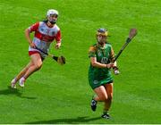 6 August 2023; Claire Coffey of Meath in action against Aoife Shaw of Derry during the Glen Dimplex All-Ireland Camogie Championship Premier Intermediate Final match between Meath and Derry at Croke Park in Dublin. Photo by Stephen Marken/Sportsfile
