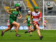 6 August 2023; Mairead McNicholl of Derry in action against Leah Devine of Meath during the Glen Dimplex All-Ireland Camogie Championship Premier Intermediate Final match between Meath and Derry at Croke Park in Dublin. Photo by Stephen Marken/Sportsfile