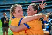 6 August 2023; Clare players Caoimhe Lallly, left, and Laura McMahon celebrate after their side's victory in the Glen Dimplex All-Ireland Camogie Championship Premier Junior Final match between Clare and Tipperary at Croke Park in Dublin. Photo by Piaras Ó Mídheach/Sportsfile
