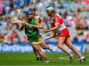 6 August 2023; Leah Lennon of Derry in action against Emma O'Connell of Meath during the Glen Dimplex All-Ireland Camogie Championship Premier Intermediate Final match between Meath and Derry at Croke Park in Dublin. Photo by Stephen Marken/Sportsfile