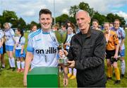 6 August 2023; John Birch presents the trophy to Eastern Women’s FL captain Jess Turner the 2023 FAI Women's Angela Hearst Inter-League Cup final match between Eastern Women's FL and Limerick Women's SSL at Leah Victoria Park in Tullamore, Offaly. Photo by Harry Murphy/Sportsfile