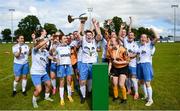 6 August 2023; Eastern Women’s FL captain Jess Turner lifts the trophy with teammates after their side's victory in the 2023 FAI Women's Angela Hearst Inter-League Cup final match between Eastern Women's FL and Limerick Women's SSL at Leah Victoria Park in Tullamore, Offaly. Photo by Harry Murphy/Sportsfile