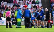 6 August 2022; Vikki Falconer of Waterford is helped onto a medical buggy to receive medical attention for an injury during the Glen Dimplex All-Ireland Camogie Championship Premier Senior Final match between Waterford and Cork at Croke Park in Dublin. Photo by Piaras Ó Mídheach/Sportsfile