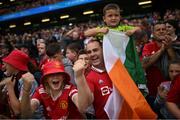 6 August 2023; Manchester United supporters celebrate their side's first goal during the pre-season friendly match between Manchester United and Athletic Bilbao at the Aviva Stadium in Dublin. Photo by David Fitzgerald/Sportsfile