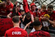 6 August 2023; Jadon Sancho, right, and Jonny Evans of Manchester United with supporters after the pre-season friendly match between Manchester United and Athletic Bilbao at the Aviva Stadium in Dublin. Photo by David Fitzgerald/Sportsfile