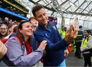6 August 2023; Ander Herrera of Athletic Bilbao takes a selfie with a supporter after the pre-season friendly match between Manchester United and Athletic Bilbao at the Aviva Stadium in Dublin. Photo by Ben McShane/Sportsfile
