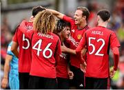 6 August 2023; Facundo Pellistri of Manchester United, centre, is congratulated by teammates after scoring their side's first goal during the pre-season friendly match between Manchester United and Athletic Bilbao at the Aviva Stadium in Dublin. Photo by David Fitzgerald/Sportsfile