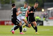 6 August 2023; Liam Burt of Shamrock Rovers in action against Cork City players Joshua Honohan, left, and Kevin Custovic during the SSE Airtricity Men's Premier Division match between Shamrock Rovers and Cork City at Tallaght Stadium in Dublin. Photo by Seb Daly/Sportsfile