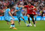 6 August 2023; Harry Maguire of Manchester United in action against Oihan Sancet of Athletic Bilbao during the pre-season friendly match between Manchester United and Athletic Bilbao at the Aviva Stadium in Dublin. Photo by David Fitzgerald/Sportsfile