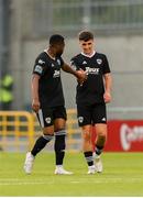 6 August 2023; Barry Coffey of Cork City, right, is congratulated by teammate Tunde Owolabi after scoring their side's first goal during the SSE Airtricity Men's Premier Division match between Shamrock Rovers and Cork City at Tallaght Stadium in Dublin. Photo by Seb Daly/Sportsfile