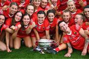 6 August 2022; Cork players celebrate with the O'Duffy Cup after their side's victory in the Glen Dimplex All-Ireland Camogie Championship Premier Senior Final match between Waterford and Cork at Croke Park in Dublin. Photo by Piaras Ó Mídheach/Sportsfile