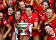 6 August 2022; Cork players including Hannah Looney, 12, of Cork celebrate with O'Duffy Cup after the Glen Dimplex All-Ireland Camogie Championship Premier Senior Final match between Waterford and Cork at Croke Park in Dublin. Photo by Stephen Marken/Sportsfile