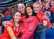 6 August 2022; Saoirse McCarthy of Cork celebrates with her parents Cella and Leonard after her side’s victory Glen Dimplex All-Ireland Camogie Championship Premier Senior Final match between Waterford and Cork at Croke Park in Dublin. Photo by Piaras Ó Mídheach/Sportsfile
