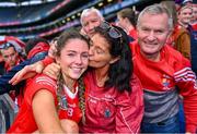 6 August 2022; Saoirse McCarthy of Cork celebrates with her parents Cella and Leonard after her side’s victory Glen Dimplex All-Ireland Camogie Championship Premier Senior Final match between Waterford and Cork at Croke Park in Dublin. Photo by Piaras Ó Mídheach/Sportsfile