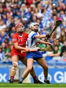 6 August 2022; Rachael Walsh of Waterford in action against Libby Coppinger of Cork during the Glen Dimplex All-Ireland Camogie Championship Premier Senior Final match between Waterford and Cork at Croke Park in Dublin. Photo by Stephen Marken/Sportsfile