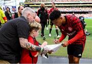 6 August 2023; Manchester United mascot Finn O'Shea, age 9, from Clonmel, Tipperary with Jadon Sancho of Manchester United before the pre-season friendly match between Manchester United and Athletic Bilbao at the Aviva Stadium in Dublin. Photo by David Fitzgerald/Sportsfile