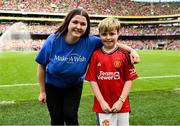 6 August 2023; Manchester United mascot Finn O'Shea, age 9, from Clonmel, Tipperary before the pre-season friendly match between Manchester United and Athletic Bilbao at the Aviva Stadium in Dublin. Photo by David Fitzgerald/Sportsfile