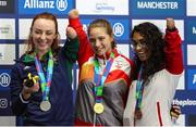 6 August 2023; Ellen Keane of Ireland, left, with her silver medal, Katarina Roxon of Canada with her gold medal, and Anastasiya Dmytriv Dmytriv of Spain with her bronze medal, after competing in Women's 100m Breaststroke SB8 final during day seven of the World Para Swimming Championships 2023 at Manchester Aquatics Centre in Manchester. Photo by Paul Greenwood/Sportsfile