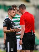 6 August 2023; Aaron Bolger of Cork City and referee Damien MacGraith during the SSE Airtricity Men's Premier Division match between Shamrock Rovers and Cork City at Tallaght Stadium in Dublin. Photo by Seb Daly/Sportsfile