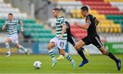 6 August 2023; Liam Burt of Shamrock Rovers in action against Cian Coleman of Cork City during the SSE Airtricity Men's Premier Division match between Shamrock Rovers and Cork City at Tallaght Stadium in Dublin. Photo by Seb Daly/Sportsfile