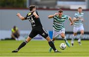 6 August 2023; Liam Burt of Shamrock Rovers in action against Rokas Stanulevicius of Cork City during the SSE Airtricity Men's Premier Division match between Shamrock Rovers and Cork City at Tallaght Stadium in Dublin. Photo by Seb Daly/Sportsfile